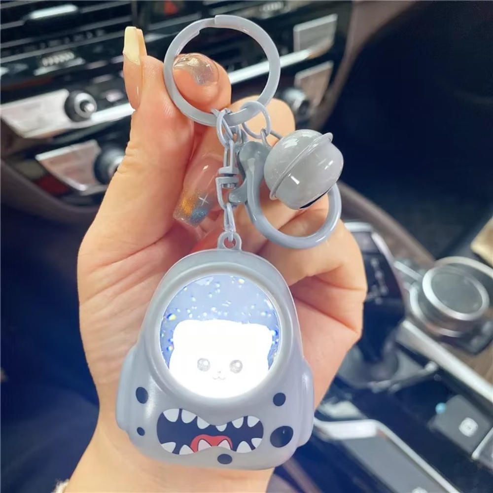 AstronautKeychain 1+1 GRATIS: Gloeiend Schattige Astronaut Dier Sleutelhanger