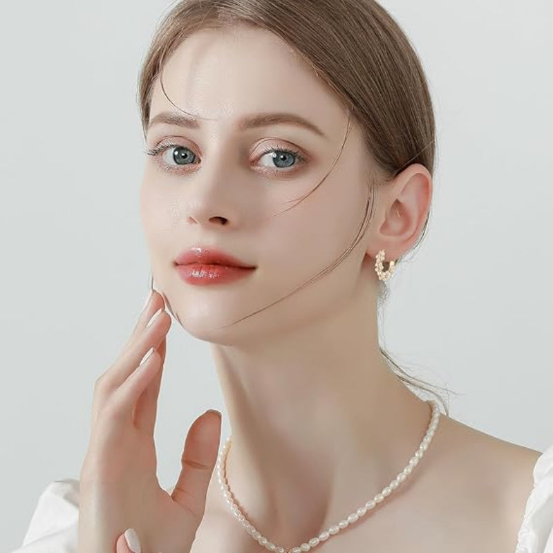 Jewelance™ TwistedEarrings 1+1 GRATIS: Elegante Gedraaide Hoepel Parels Mode Oorbellen