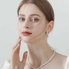 Jewelance™ TwistedEarrings 1+1 GRATIS: Elegante Gedraaide Hoepel Parels Mode Oorbellen