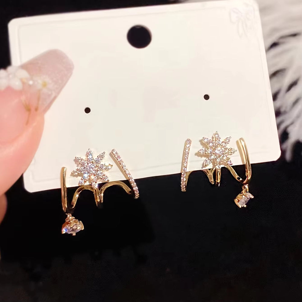 Jewelance™ ClawEarrings 1+1 GRATIS - Mode Sprankelende Klauw Oorknopjes