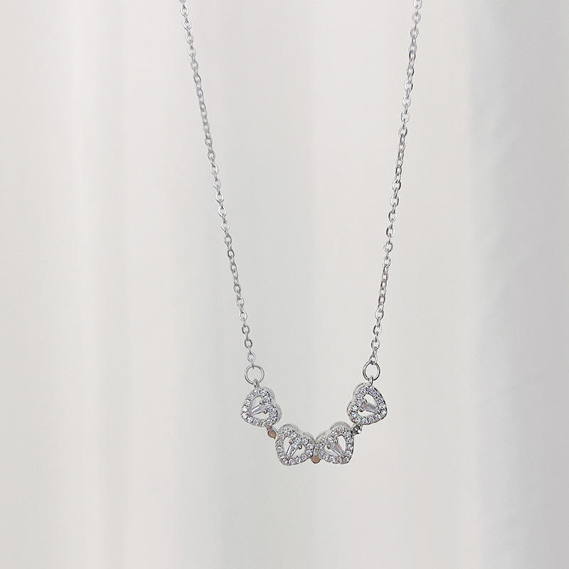 Jewelance™ CloverNecklace 1+1 GRATIS: Stijlvolle Twee-Stijl Magnetische Hart Klaver Ketting