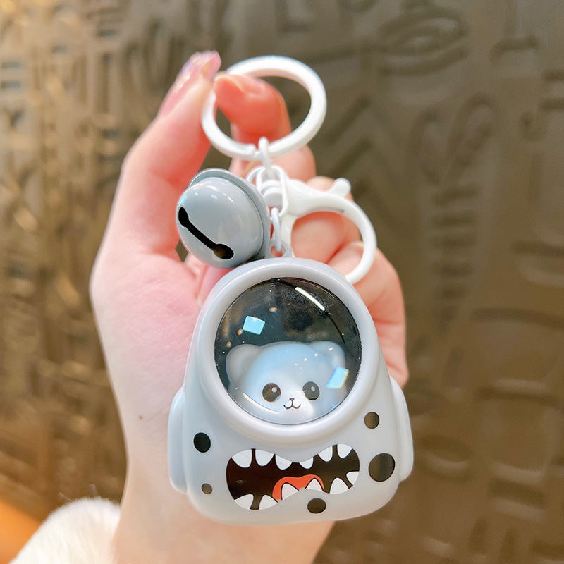 AstronautKeychain 1+1 GRATIS: Gloeiend Schattige Astronaut Dier Sleutelhanger