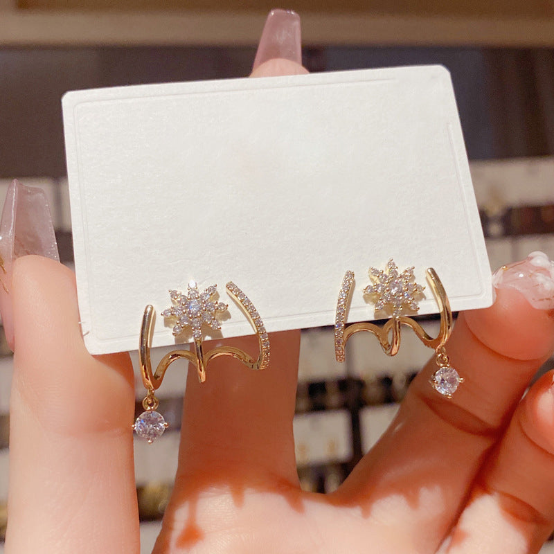 Jewelance™ ClawEarrings 1+1 GRATIS - Mode Sprankelende Klauw Oorknopjes